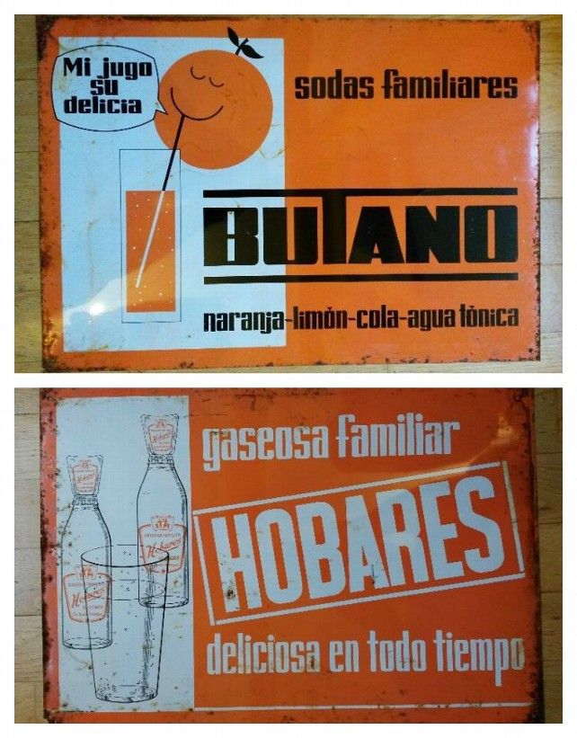 Muy similares carteles promocionales de ambas marcas de bebidas carbónicas.